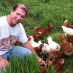 farmer with chickens